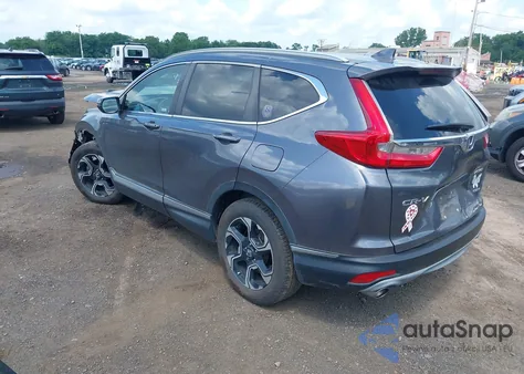2018 Honda Cr-V Touring from USA, damaged, VIN 2HKRW2H94JH674399